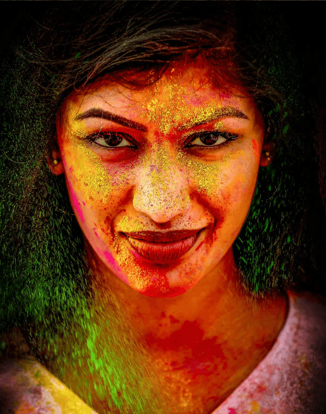 Colourful close-up portrait during Holi